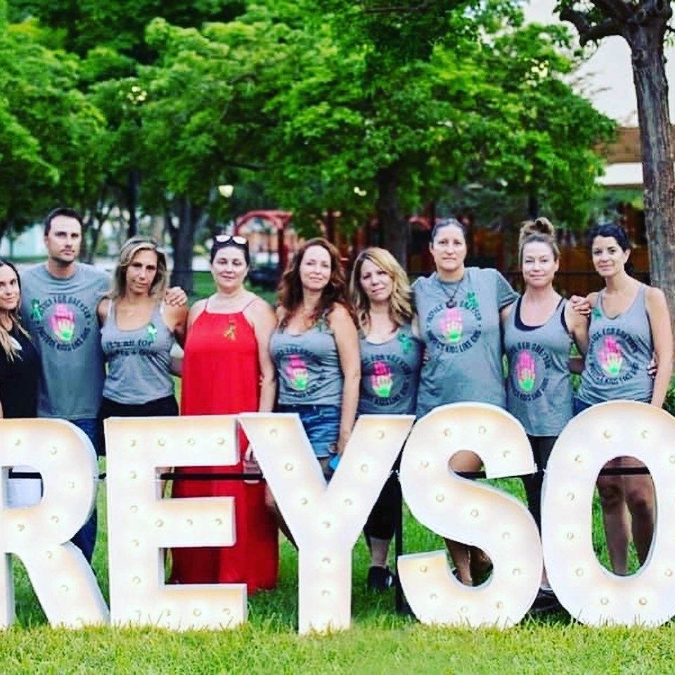 Group wearing Justice for Greyson shirts